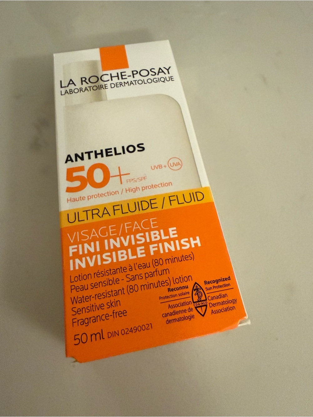 La Roche-Posay Anthelios Ultra Fluid SPF 50+ Invisible Finish - Orange/White